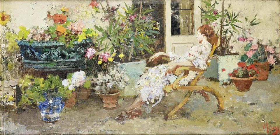 La moglie sulla terrazza di casa